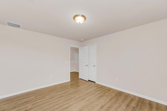 310 Garcitas Creek Ln, Hutto, TX 78634 - spare room with baseboards and light wood-style flooring