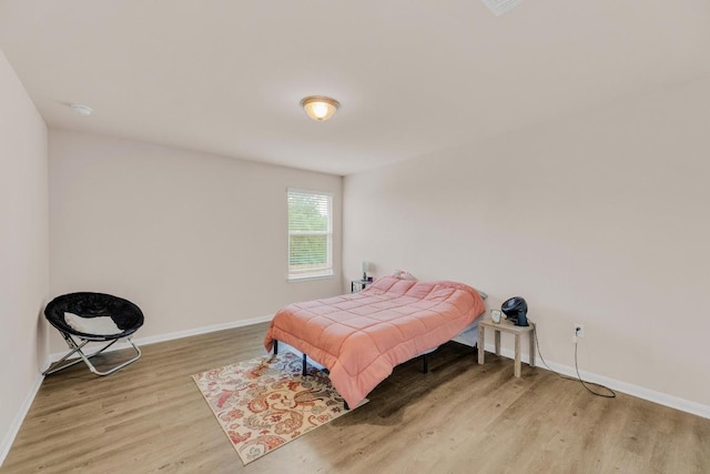310 Garcitas Creek Ln, Hutto, TX 78634 - bedroom featuring light wood finished floors and baseboards