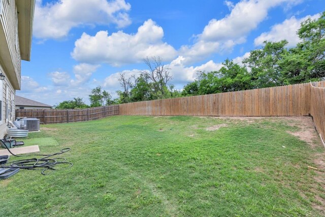 310 Garcitas Creek Ln, Hutto, TX 78634 - view of yard featuring central air condition unit