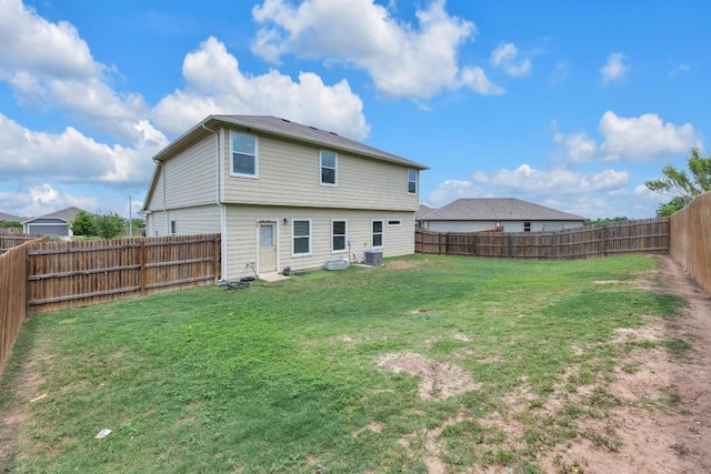310 Garcitas Creek Ln, Hutto, TX 78634 - back of property featuring central air condition unit