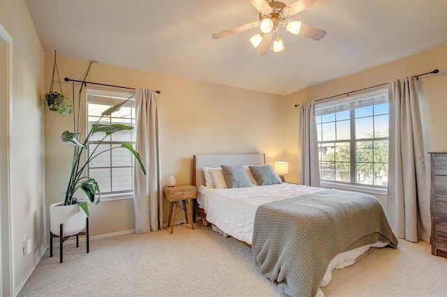 1310 W Parmer Ln Unit 2701, Austin, TX 78727 - bedroom featuring baseboards, ceiling fan, and carpet floors