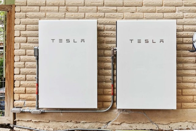 1610 Old Tract Rd, Pflugerville, TX 78660 - exterior view of wall-mounted power storage