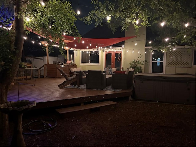 exterior space with an outdoor hangout area, a wooden deck, and a hot tub