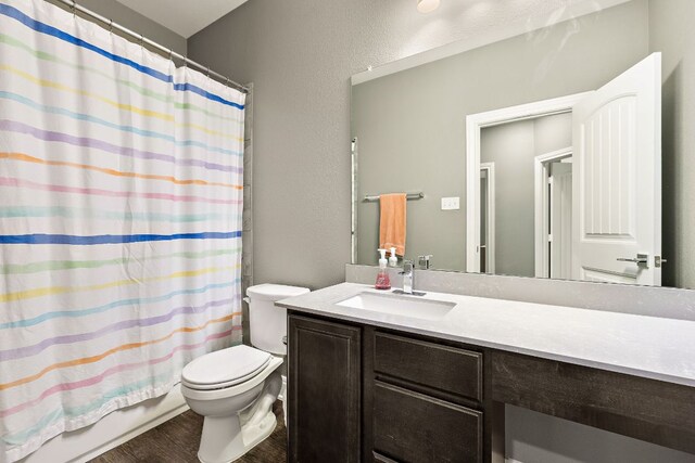 404 Buttercup Creek Blvd Unit 11, Cedar Park, TX 78613 - full bath with vanity, wood finished floors, and shower / bathtub combination with curtain
