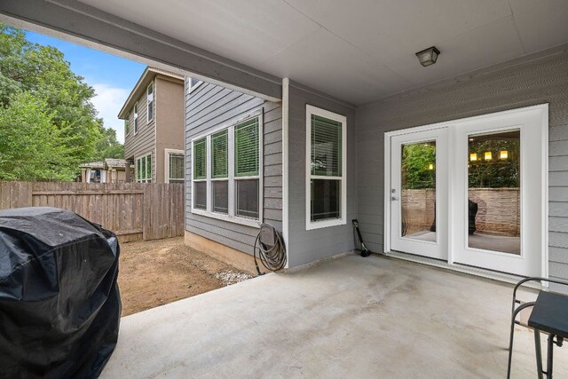 404 Buttercup Creek Blvd Unit 11, Cedar Park, TX 78613 - view of patio featuring a grill