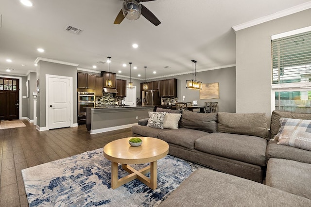 404 Buttercup Creek Blvd Unit 11, Cedar Park, TX 78613 - living room featuring a ceiling fan, ornamental molding, recessed lighting, and dark wood finished floors