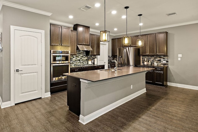 404 Buttercup Creek Blvd Unit 11, Cedar Park, TX 78613 - kitchen with stainless steel appliances, a sink, under cabinet range hood, tasteful backsplash, and crown molding