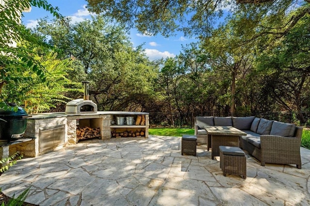 2901 Meandering River Ct, Austin, TX 78746 - view of patio featuring an outdoor living space with a fireplace, fence, and a grill