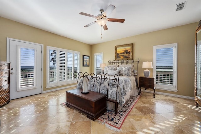 2400 W Fitzhugh Rd, Dripping Springs, TX 78630 - bedroom with tile patterned flooring, baseboards, and ceiling fan