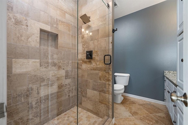 2400 W Fitzhugh Rd, Dripping Springs, TX 78630 - bathroom featuring a tile shower, toilet, vanity, and baseboards