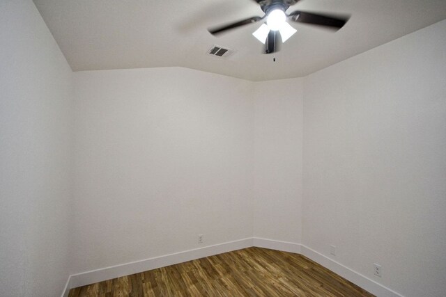 2539 Fayette Dr, New Braunfels, TX 78130 - spare room featuring ceiling fan, baseboards, wood finished floors, and vaulted ceiling