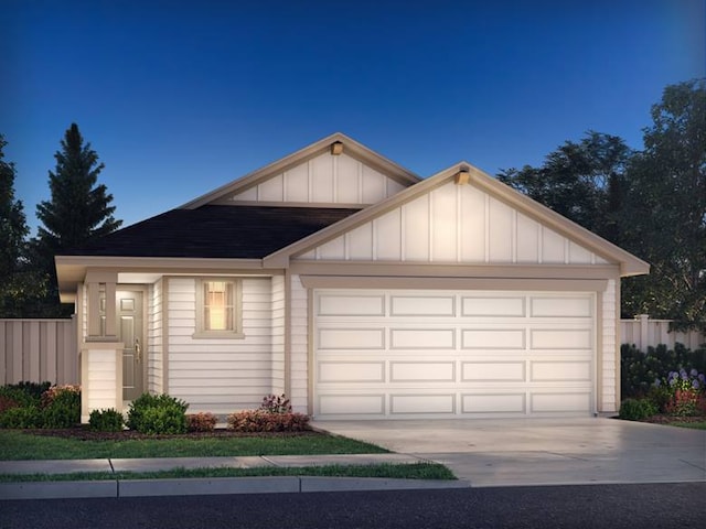ranch-style home with an attached garage, board and batten siding, driveway, and fence