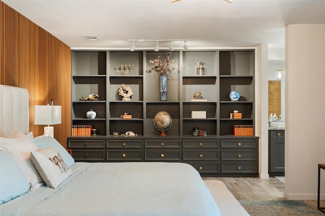 113 Comet, Lakeway, TX 78734 - bedroom featuring visible vents and wood finished floors