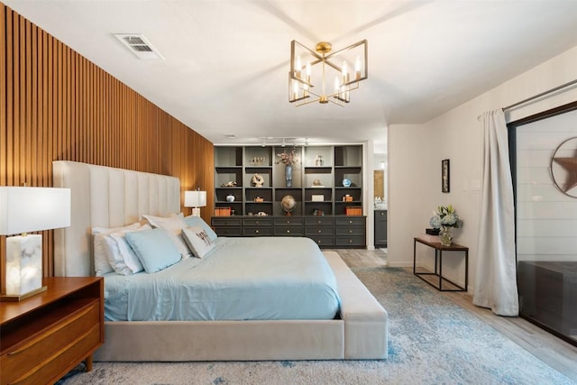 113 Comet, Lakeway, TX 78734 - bedroom featuring a chandelier