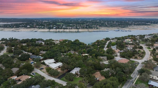 113 Comet, Lakeway, TX 78734 - aerial view at dusk featuring a water view and a residential view