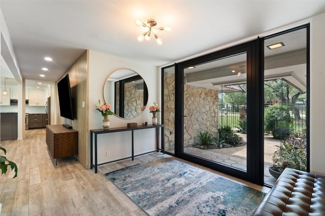 113 Comet, Lakeway, TX 78734 - foyer with a notable chandelier, light wood-style floors, and recessed lighting