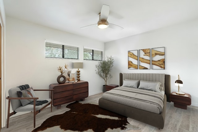 113 Comet, Lakeway, TX 78734 - bedroom with baseboards, a ceiling fan, and wood finished floors