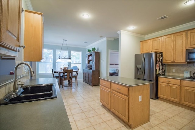 2005 Forest Hill Cv, Round Rock, TX 78665 - kitchen featuring stainless steel fridge with ice dispenser, a sink, ornamental molding, decorative backsplash, and a kitchen island