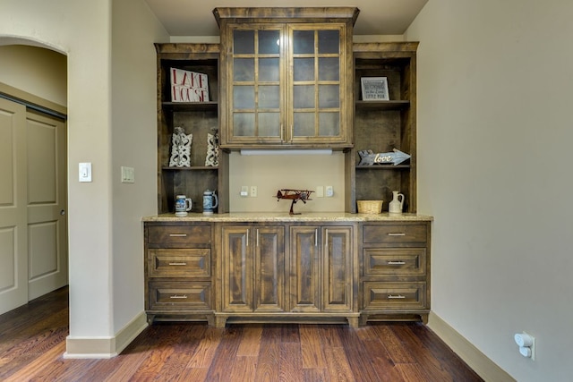 600 Mountain Dew Rd, Horseshoe Bay, TX 78657 - bar featuring baseboards and dark wood-type flooring