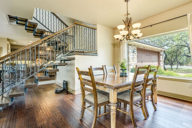 600 Mountain Dew Rd, Horseshoe Bay, TX 78657 - dining space featuring stairs, visible vents, a chandelier, wood-type flooring, and baseboards