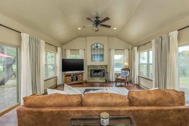 600 Mountain Dew Rd, Horseshoe Bay, TX 78657 - living room featuring vaulted ceiling, a wealth of natural light, and wood finished floors