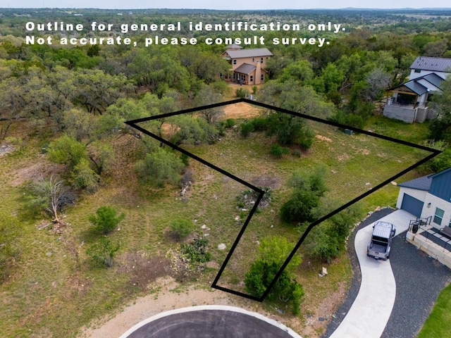 600 Mountain Dew Rd, Horseshoe Bay, TX 78657 - aerial view featuring a view of trees