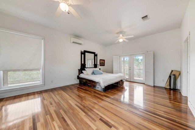 3701 Fischer Store Rd, Wimberley, TX 78676 - bedroom with a ceiling fan, light wood-style floors, access to outside, and visible vents