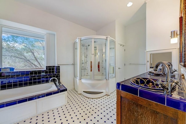3701 Fischer Store Rd, Wimberley, TX 78676 - full bathroom featuring a stall shower and a garden tub
