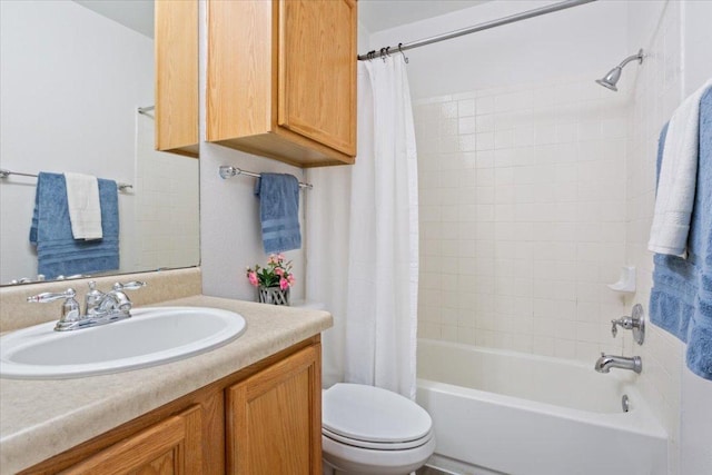 full bathroom featuring vanity, toilet, and shower / bath combo with shower curtain