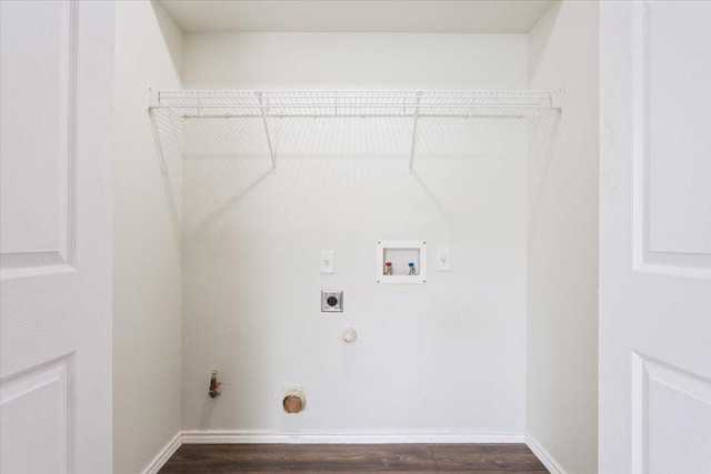 clothes washing area with electric dryer hookup, laundry area, washer hookup, hookup for a gas dryer, and dark wood-style floors