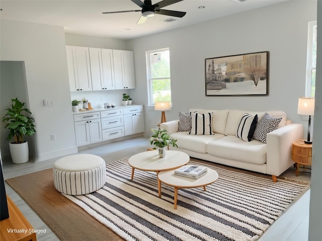 1500 Sylvan Glade Rd Unit 1A, Austin, TX 78745 - living area with ceiling fan and baseboards