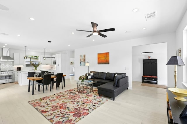 1500 Sylvan Glade Rd Unit 1A, Austin, TX 78745 - living area featuring a ceiling fan, light wood finished floors, and recessed lighting