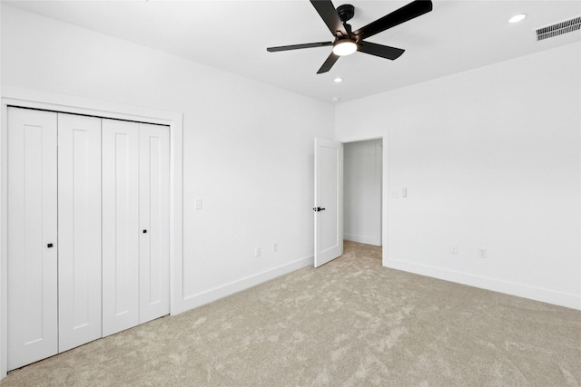 1500 Sylvan Glade Rd Unit 1A, Austin, TX 78745 - unfurnished bedroom with carpet floors, recessed lighting, a closet, and a ceiling fan