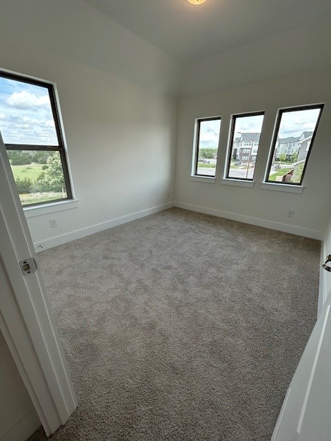 565 Raleigh Dr, Georgetown, TX 78633 - carpeted empty room featuring baseboards