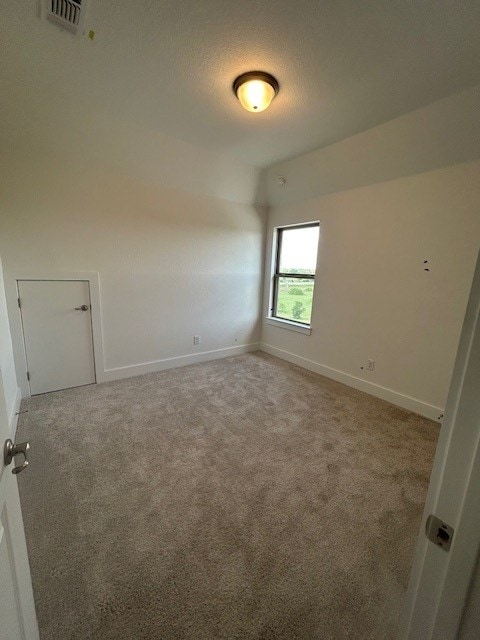 565 Raleigh Dr, Georgetown, TX 78633 - empty room with light carpet and baseboards