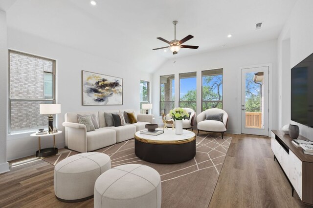 565 Raleigh Dr, Georgetown, TX 78633 - living room featuring wood finished floors, recessed lighting, ceiling fan, and lofted ceiling