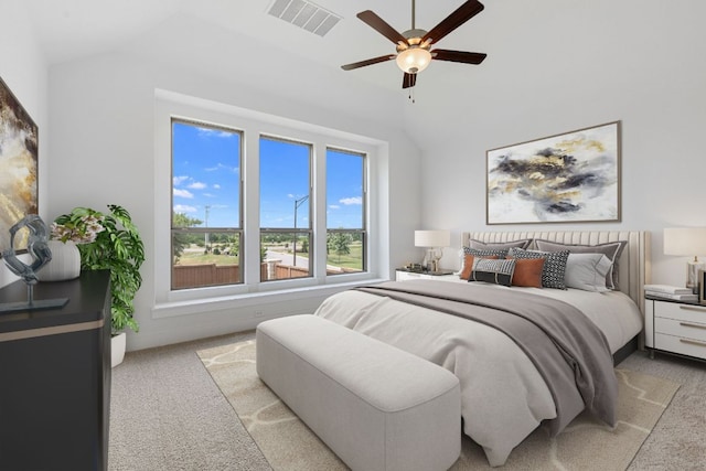 565 Raleigh Dr, Georgetown, TX 78633 - bedroom featuring light colored carpet, lofted ceiling, and a ceiling fan