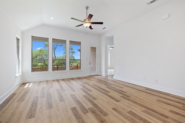 565 Raleigh Dr, Georgetown, TX 78633 - unfurnished living room featuring ceiling fan, light wood-style floors, vaulted ceiling, and recessed lighting