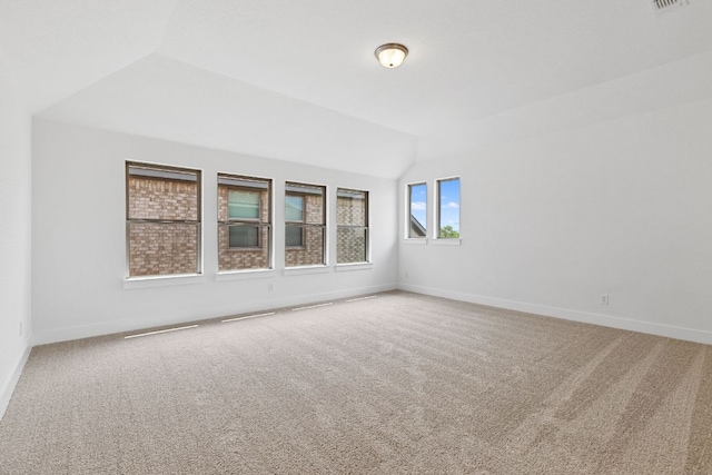 565 Raleigh Dr, Georgetown, TX 78633 - carpeted spare room with vaulted ceiling and baseboards