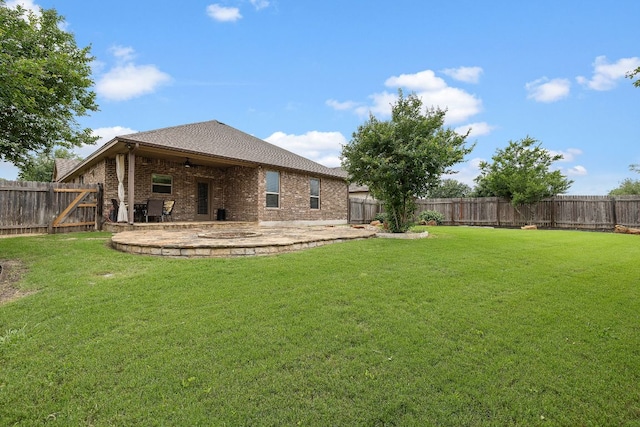 view of yard featuring a fenced backyard and a patio