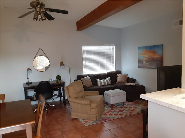 tiled living room featuring ceiling fan, beamed ceiling, and visible vents