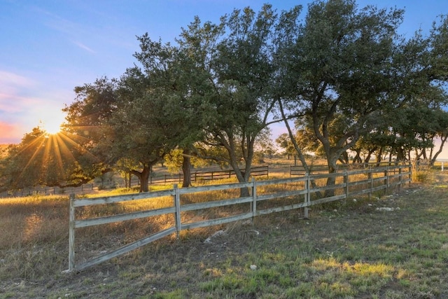 18700 Madrone Ranch Trl, Austin, TX 78738 - yard at dusk featuring a rural view and fence