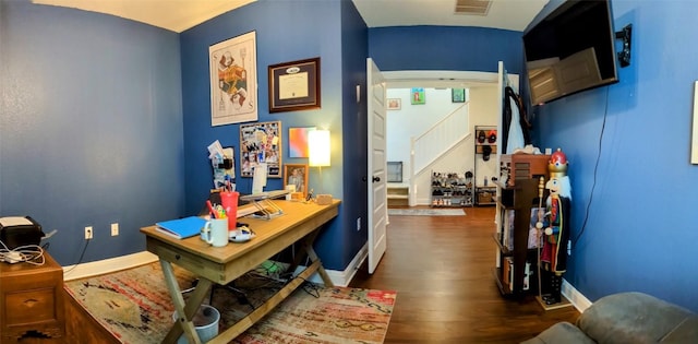 7617 Rio Pass, Austin, TX 78724 - office area with dark wood-style floors and baseboards