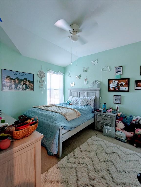 7617 Rio Pass, Austin, TX 78724 - carpeted bedroom with a ceiling fan