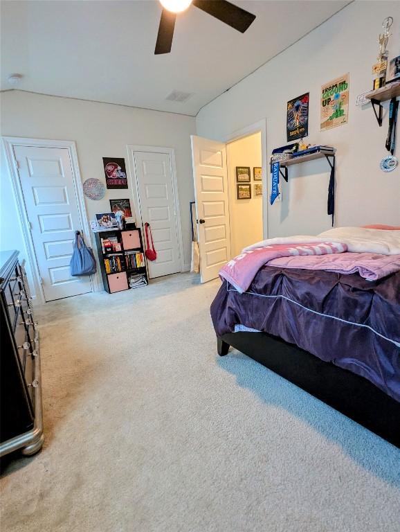 7617 Rio Pass, Austin, TX 78724 - carpeted bedroom featuring a ceiling fan