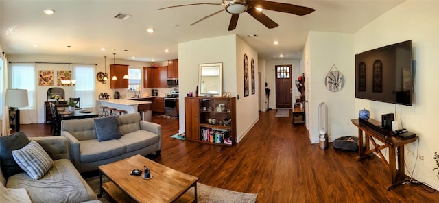 7617 Rio Pass, Austin, TX 78724 - living room featuring dark wood finished floors, a ceiling fan, and recessed lighting