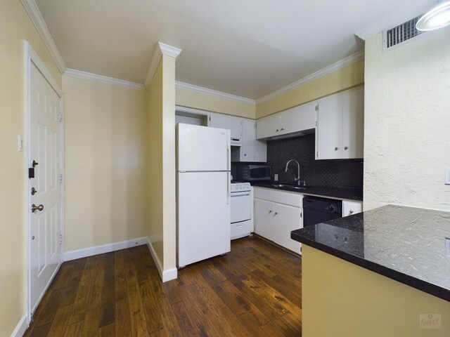 803 W 28th St Unit 206, Austin, TX 78705 - kitchen featuring black appliances, dark wood finished floors, crown molding, backsplash, and white cabinetry