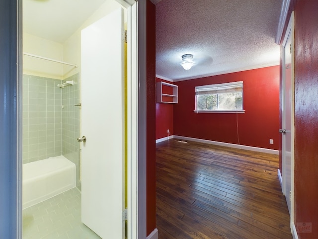 803 W 28th St Unit 206, Austin, TX 78705 - full bath with hardwood / wood-style flooring and a textured ceiling