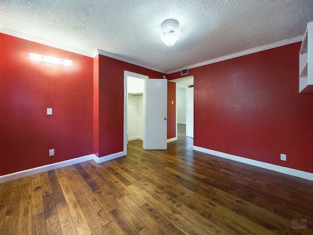 803 W 28th St Unit 206, Austin, TX 78705 - unfurnished room with a textured ceiling, visible vents, and hardwood / wood-style flooring