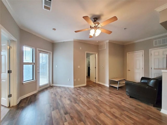 2502 Leon St Unit 515, Austin, TX 78705 - unfurnished living room with baseboards, visible vents, wood finished floors, and a ceiling fan